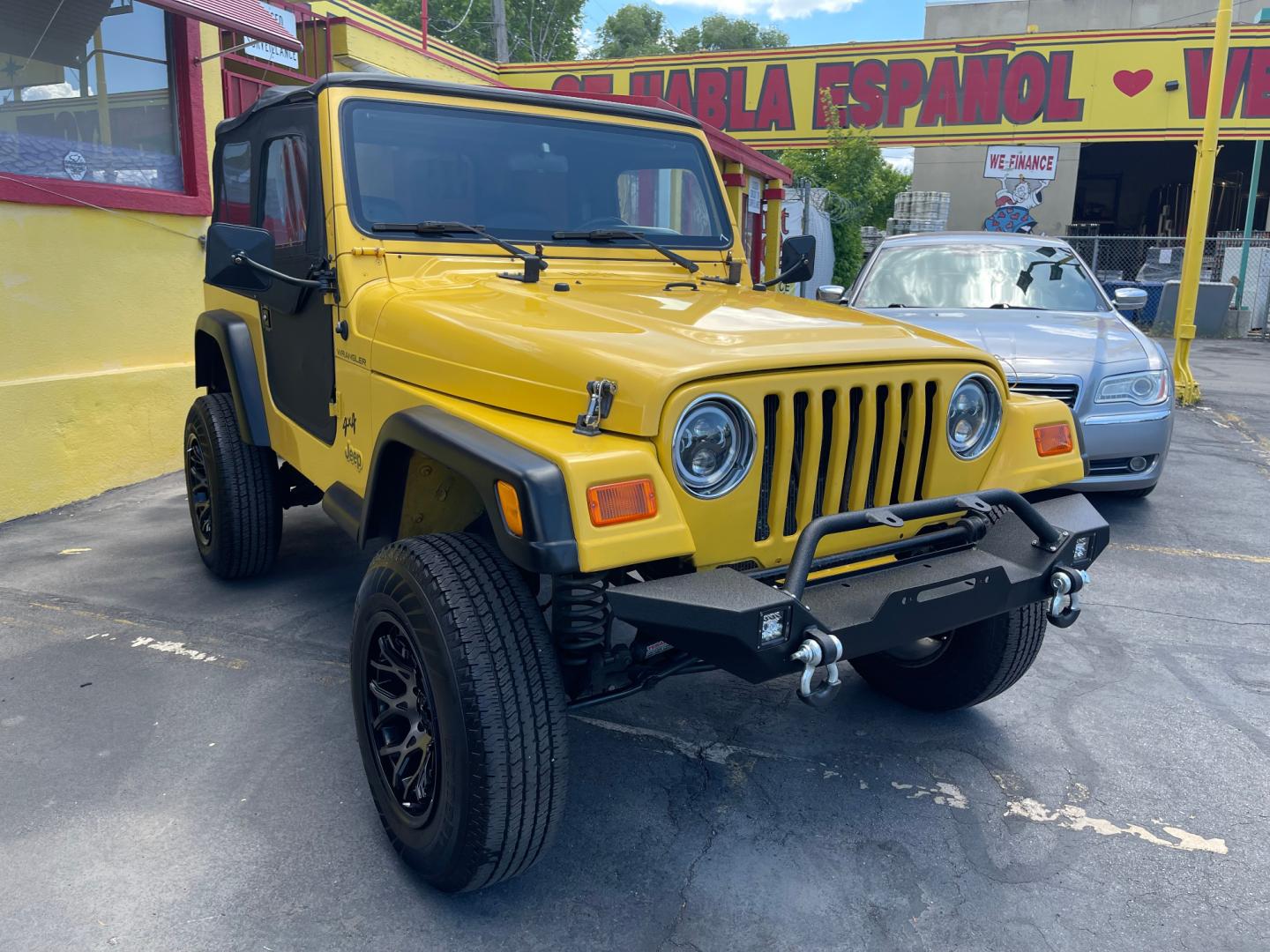 2000 Solar Yellow /Black Jeep Wrangler SE (1J4FA29P9YP) with an 2.5L 4 Cyl. engine, Manual transmission, located at 801 South State Street, Salt Lake City, UT, 84111, (801) 328-0098, 40.751953, -111.888206 - Wow extremely rare to find extra clean Jeep in immaculate condition 4x4! Low miles only 98,248 miles! Interior and exterior are both in excellent shape for the year. This is a clean title no reported accidents on the CarFax history report. It has passed emissions already and is ready to go. Featur - Photo#11